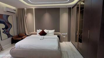 Economy Apartment, Balcony, City View | Desk, laptop workspace, blackout curtains, soundproofing