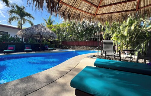 Relaxed boutique living in lush gardens, perfectly located in Playas del Coco