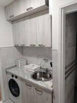 Estúdio, 1 quarto, para fumantes, vista para a cidade | Lavanderia