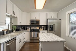 Fridge, microwave, oven, stovetop - Colorado Getaway: Movie Theater, Hot Tub, Game Room, Huge Fenced-in Yard (Arvada)