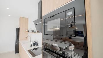 Comfort Villa, Balcony, Pool View | Private kitchen | Espresso maker, coffee/tea maker, electric kettle, high chair