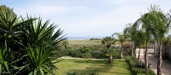 Lucido House in front of the Tonnara