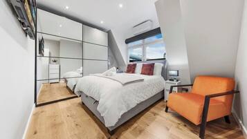 2 habitaciones, tabla de planchar con plancha, wifi y ropa de cama