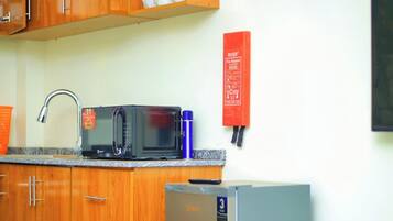 Comfort Apartment, Balcony, City View | Private kitchen | Fridge, microwave, oven, stovetop