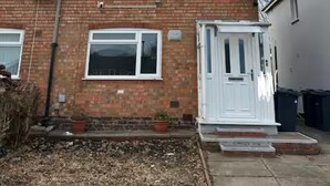 A two-story brick house with a white door and windows. - Long Contractor Stays - HS2 NEC BHX Parking Wifi Netflix Discounts Offered (Birmingham)