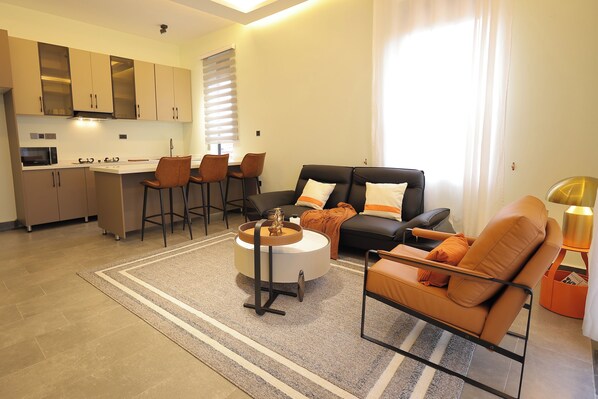 Premium Apartment, Balcony, Hill View | Living area - Heritage Residences-Industrial Loft (Kampala)