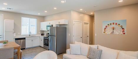 Apartment | Living area | 65-inch Smart TV with cable channels