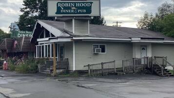 A diner with a sign reading "Robin Hood Diner & Pub".