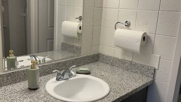 Hair dryer, towels, soap, toilet paper