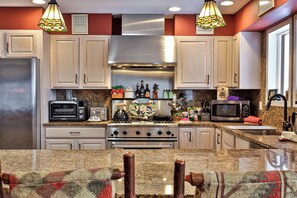 Private kitchen - Ski-In/Ski-Out Log Cabin on Great Eastern Trail | Hot Tub, Sauna, Game Room (Killington)