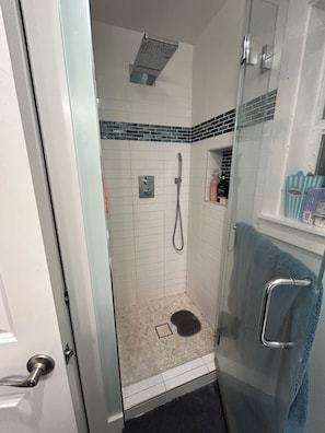 Shower, hair dryer, towels, soap