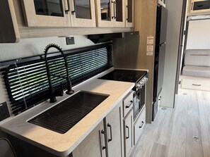 Private kitchen - Cozy 1-Bedroom RV Near Hard Rock Stadium with AC 👣 distance from the stadium  (Miami Gardens)