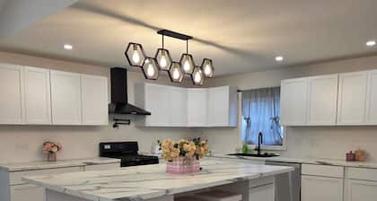 Modern & open 3-bedroom house with 3 stall garage in a perfect location..