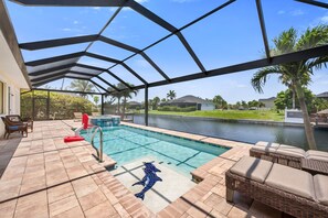 Outdoor pool, a heated pool - NEW LISTING: Relaxing Escape! Waterfront Heated Pool Oasis (Cape Coral)