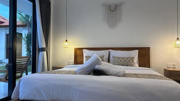 Deluxe Room, Garden View | Desk, laptop workspace, free WiFi