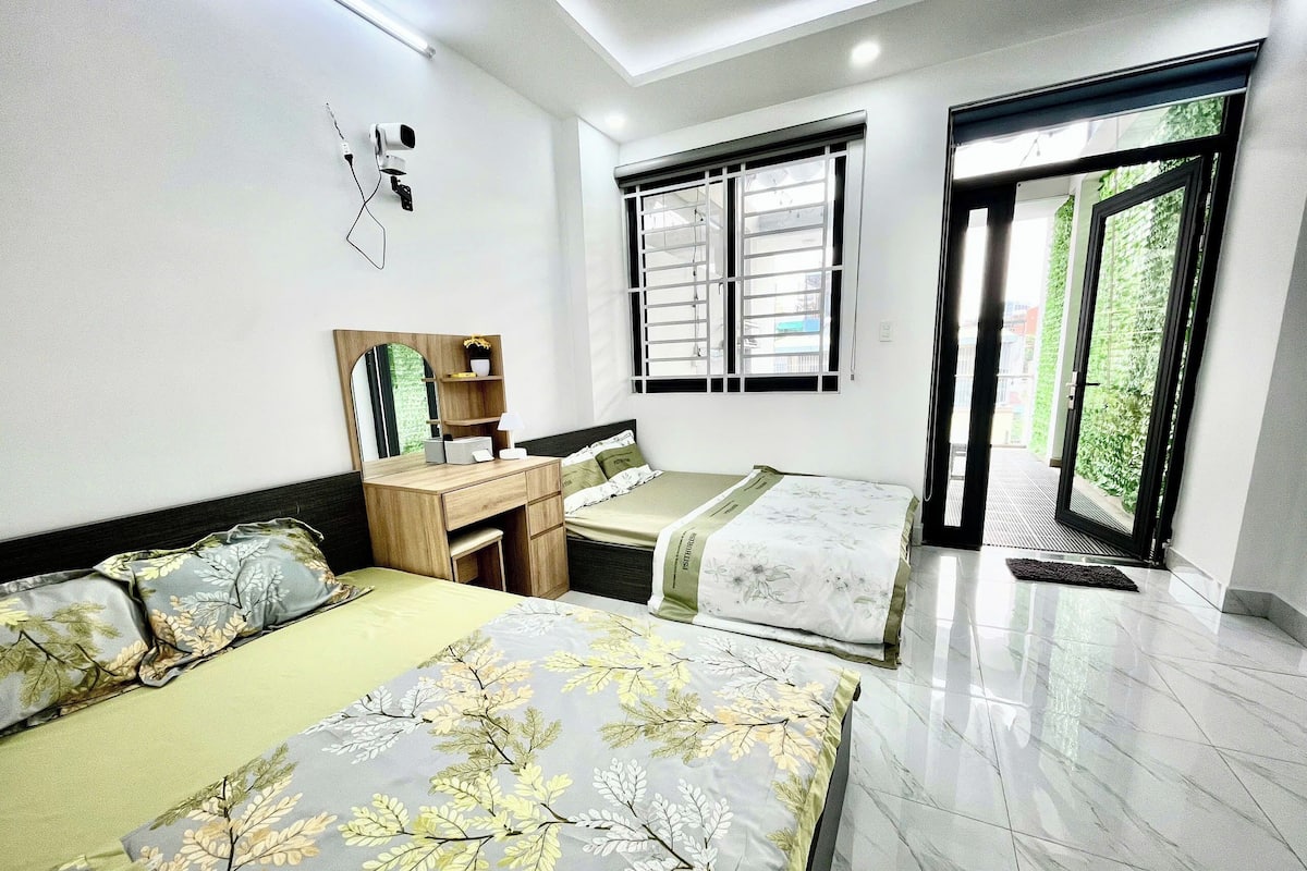 Deluxe Quadruple Room, Balcony, City View | Desk, free WiFi