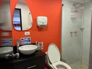 Classic Double Room, Balcony, Garden View | Bathroom | Slippers - Red deer suites (Elliot Lake)