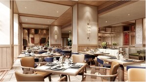 A spacious restaurant with multiple dining tables and chairs, high ceilings, and modern lighting fixtures. - Slohh by Roach Bengaluru, Curio Collection by Hilton (Bengaluru)