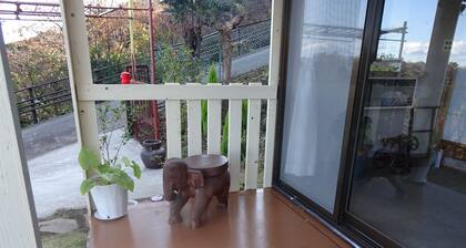 Inn in an old house connecting the blue sea and travelers by post