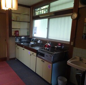 Fridge, microwave, cookware/dishes/utensils, spices