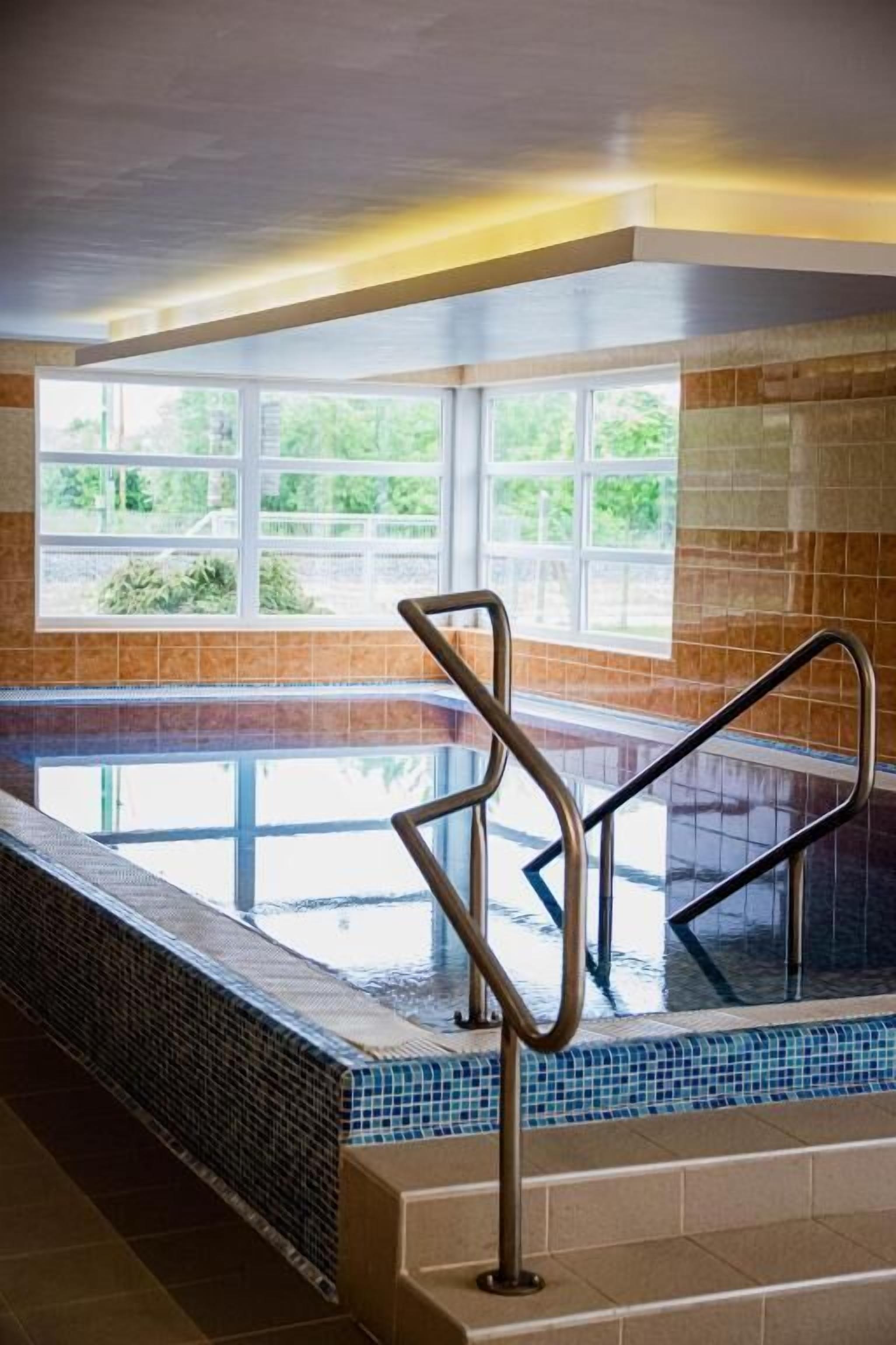 Suite, Balcony, Courtyard View | Pool | Indoor pool, sun loungers