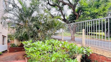 Family Apartment, Garden View | Property grounds