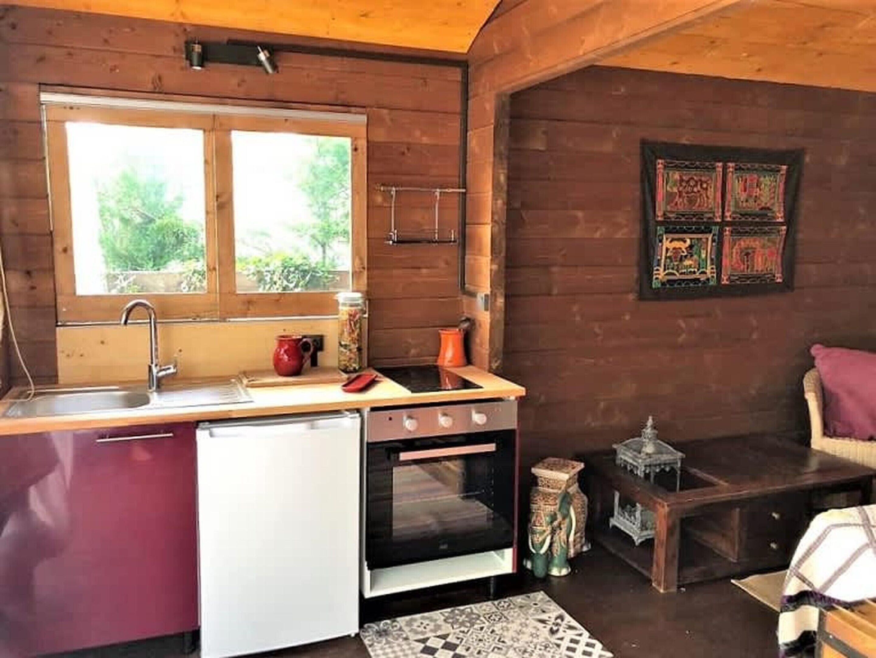 Villa | Private kitchen | Stovetop, high chair, cookware/dishes/utensils, cleaning supplies