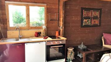 Villa | Private kitchen | Stovetop, high chair, cookware/dishes/utensils, cleaning supplies