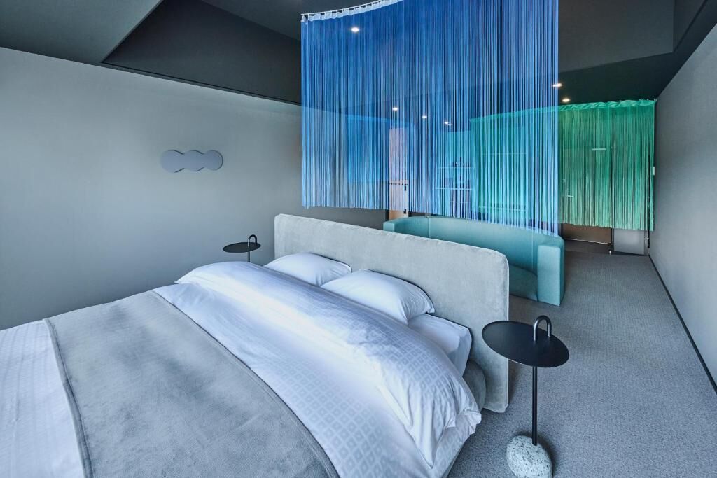 Luxury Suite, Balcony, Mountain View | In-room safe, iron/ironing board, free WiFi