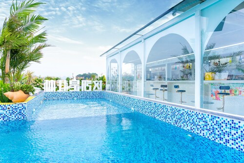 Global Village Riverside Hotel