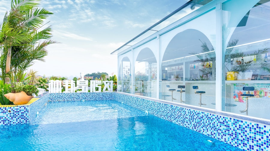 Global Village Riverside Hotel