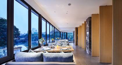 Global Village Riverside Hotel