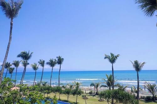On the beach, black sand