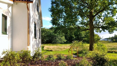 The white vacation home by the sea in southern Sweden