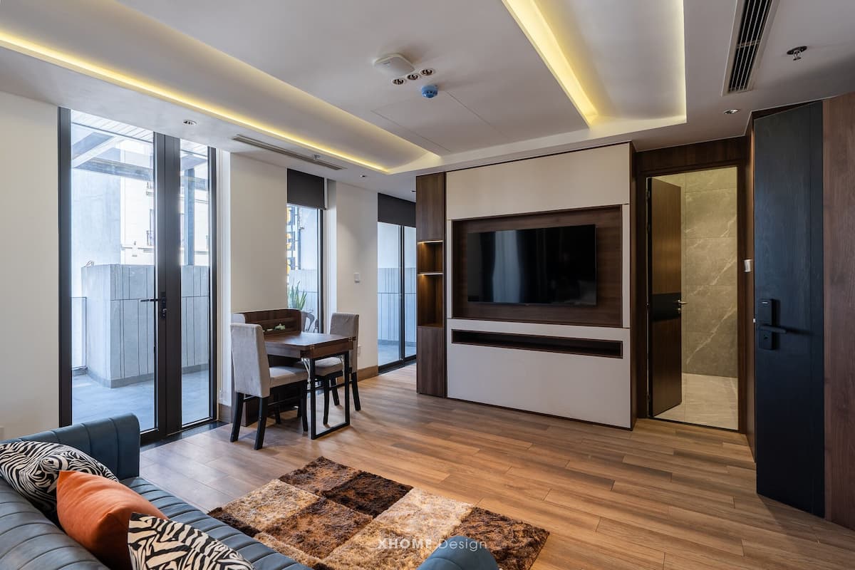 Design Penthouse, Balcony, Partial Sea View | Living area | 40-inch LCD TV with cable channels