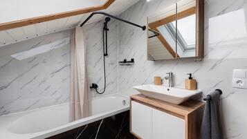 Shower, hair dryer, towels