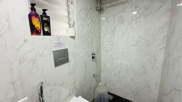 Shower, towels, soap, shampoo