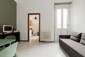 TV - GuestHost - A comfortable and welcoming 55 square meters apartment, perfect for four people, located on the mezzanine floor of a building (accessible via a few steps).The property is located between the vibrant Chinatown district and the Sempione area, M (Milan)