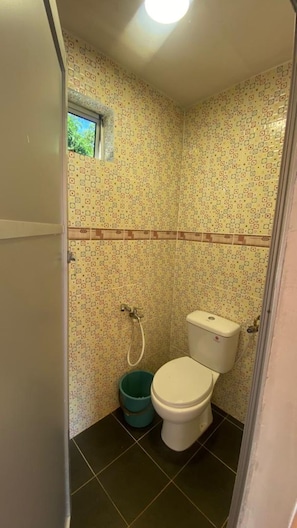 Habitación Deluxe doble | Baño | Ducha y cabezal de ducha tipo lluvia
