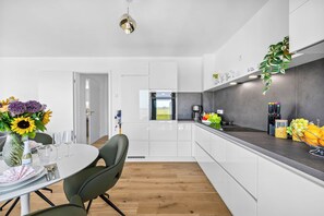 Coffee/tea maker, fridge, oven, stovetop - The View B09 Austernfischer - Sea view, balcony, shared. Sauna, parking space (Dagebüll)