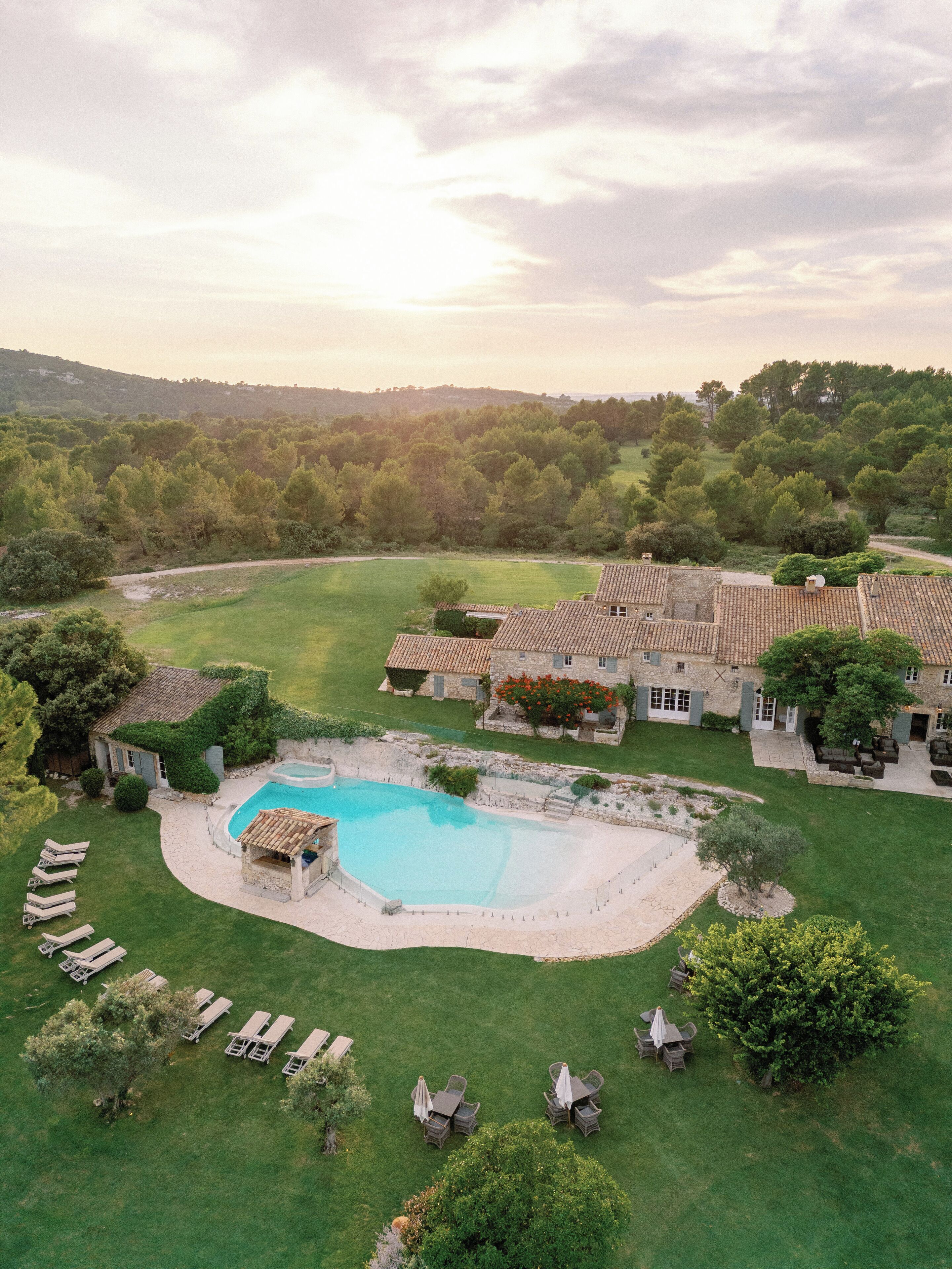 Seasonal outdoor pool, open 8:30 AM to 8:30 PM, pool umbrellas