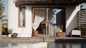 Deluxe Suite, Partial Sea View | Pool | Seasonal outdoor pool