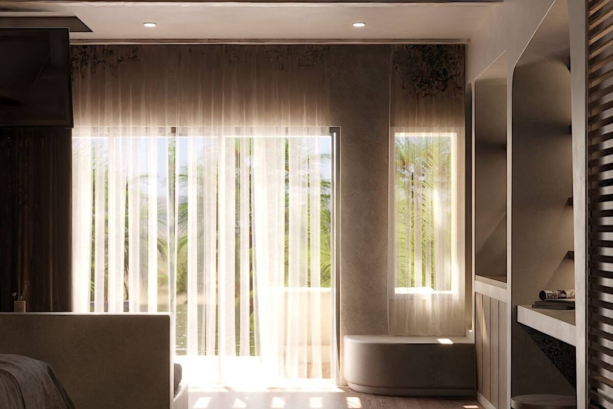 Deluxe Suite, Partial Sea View | In-room safe, iron/ironing board, free WiFi