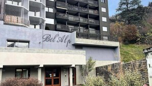 A building with a sign reading "Bel's Alp" and a modern architectural design. - Apartment in Saint Gervais Near Cable Car (Saint-Gervais-les-Bains)