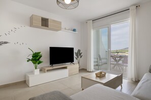 TV - Modern Atlanterra Apartment with Shared Pool, Solar Panels, Battery & Backup (Atlanterra)