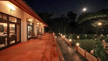 Deluxe eenpersoonskamer, uitzicht op tuin | Terras