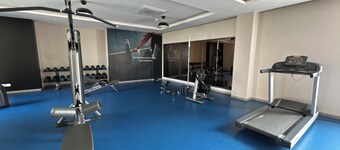 2-bedroom apartment in serene GIFT city with AC, Pool, Gym, Family/Business Stay