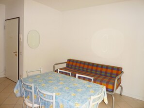 Apartment, 2 Bedrooms, Patio, Garden View | Dining room - Comfortable Flat With a Private Courtyard (San Michele al Tagliamento)
