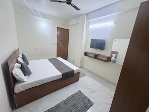 Double Room, Balcony, City View | Desk, laptop workspace, blackout drapes, soundproofing - Hotel 69 (Gurugram)