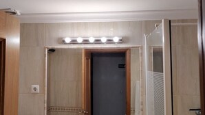 An elevator with a lighted panel and a door with a sign. - 🏖 Beach Days, Park Views & Easy Living A Perfect Algarve Family Escape (Silves)